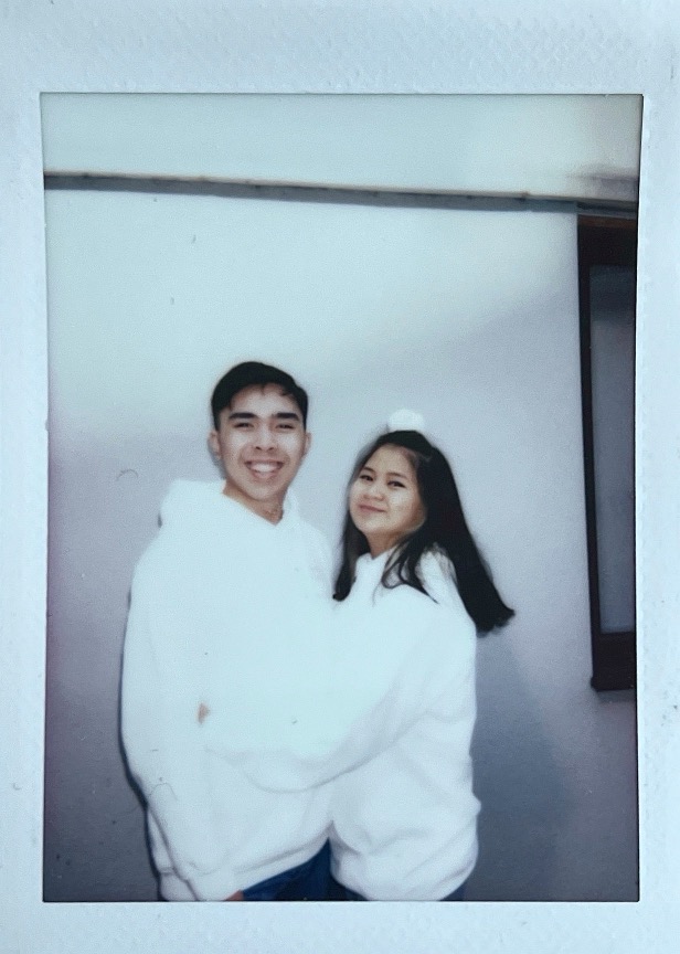 Jon and Mika wearing matching hoodie